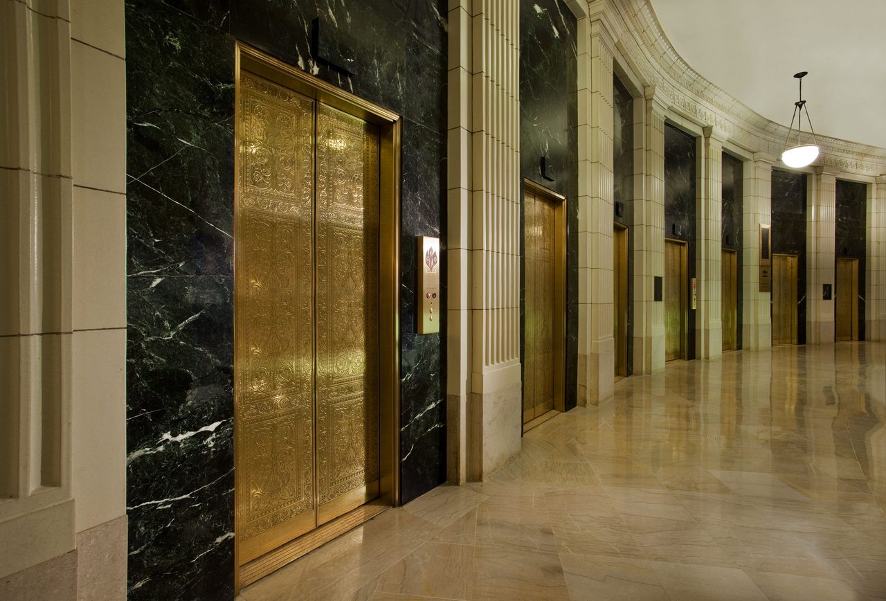 Gold lift doors